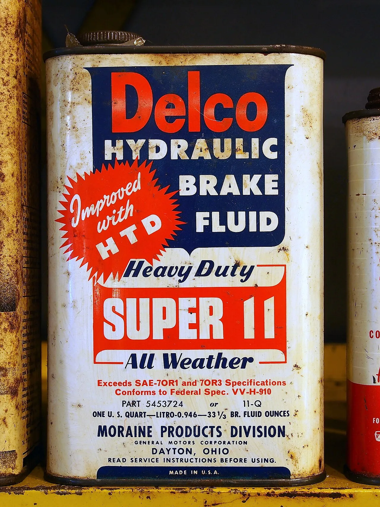 Fresh brake fluid being flushed through a vehicle during mobile service in San Antonio